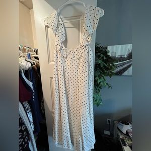 White casual dress with black polka dots